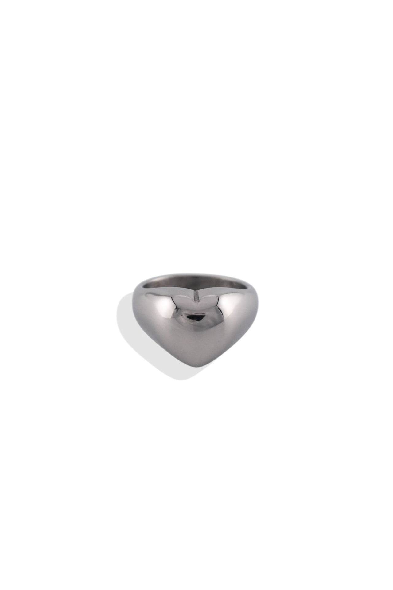 A silver chunky heart-shaped ring with a sleek design.