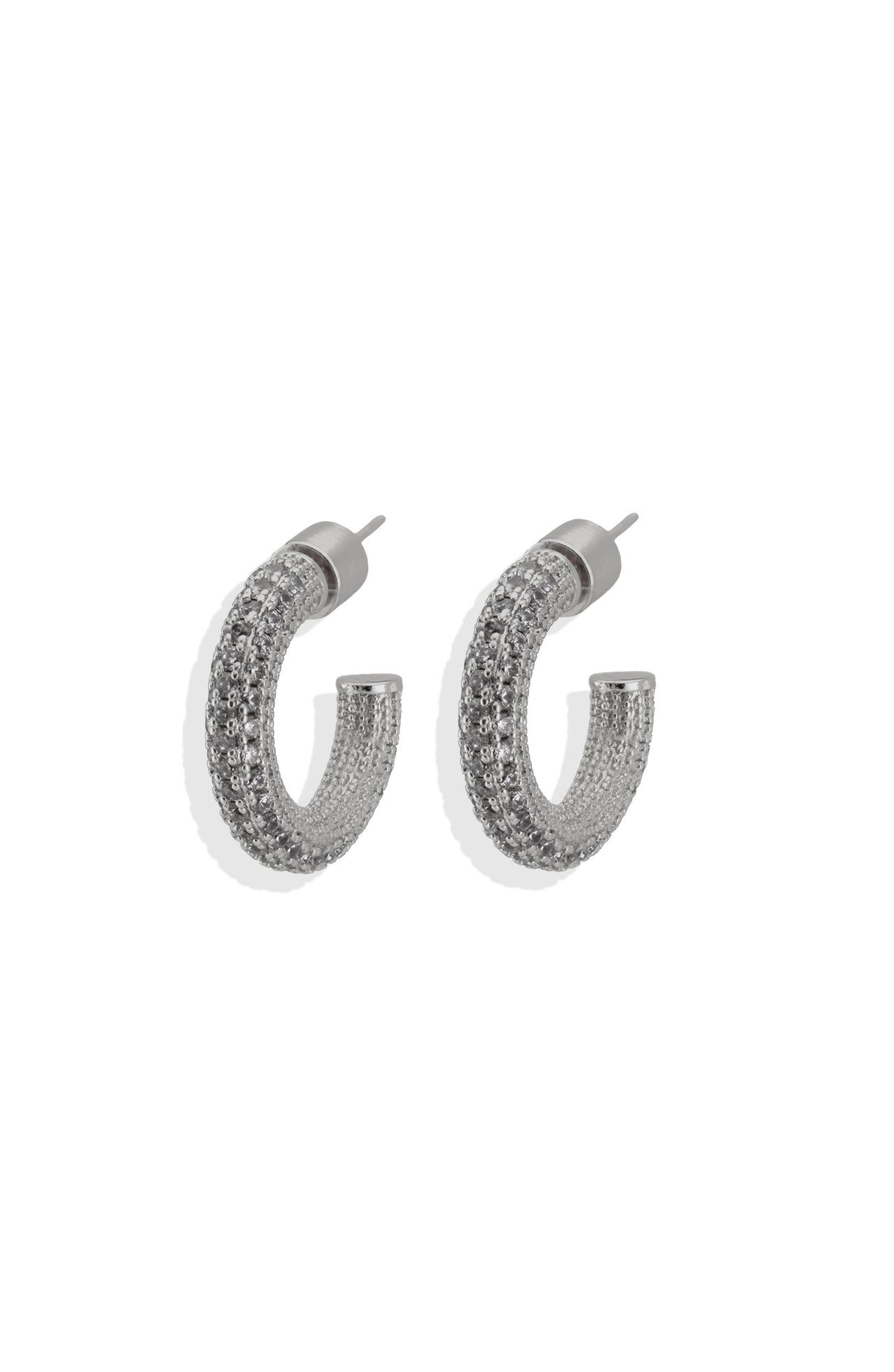 A pair of silver-colored pave hoop earrings with gold detailing and cubic zirconia crystals.