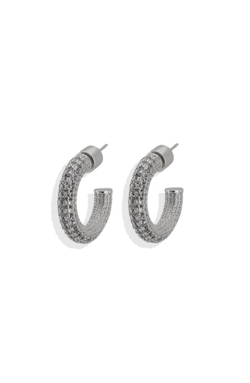 A pair of silver-colored pave hoop earrings with gold detailing and cubic zirconia crystals.