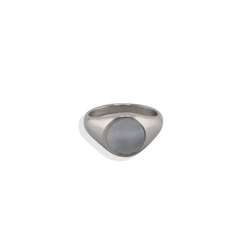 Silver ring with a gray stone on a white background