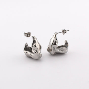 hammered silver earrings post back on white background